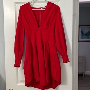 Beautiful mini dress. Like new! Only worn once. Deep V neck